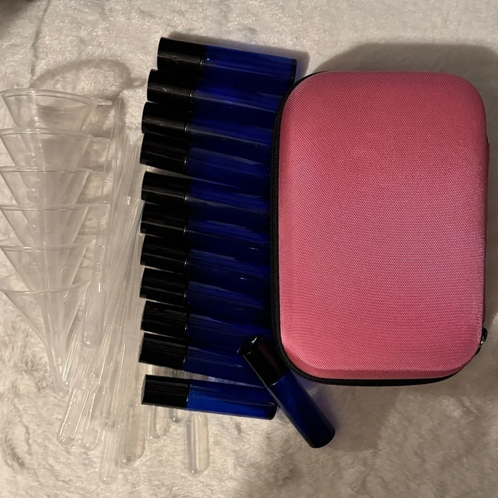 Pink and Black Travel Case with 12 Blue Roll On Bottles with Funnels Pipettes